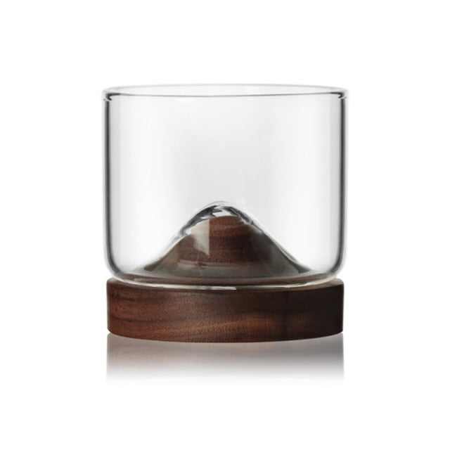 Unique whiskey glass with a solid Walnut base